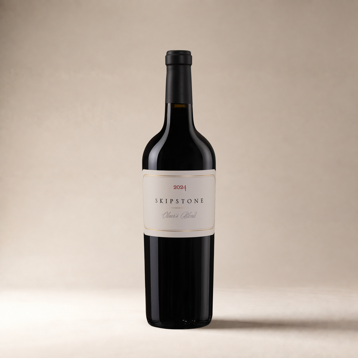 2024 Skipstone Oliver's Blend bottle on a warm neutral studio background